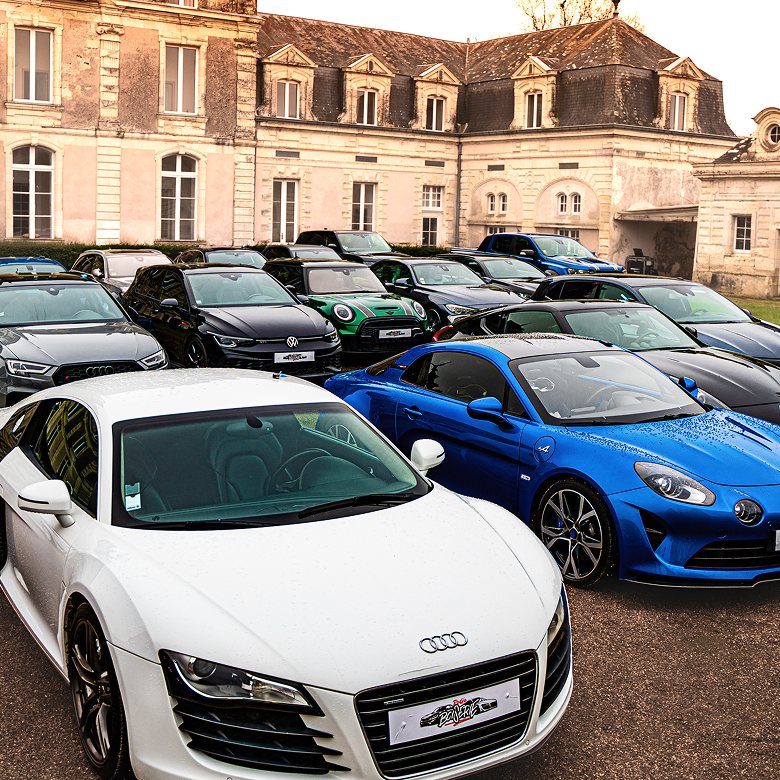 The thirty cars lined up at the château