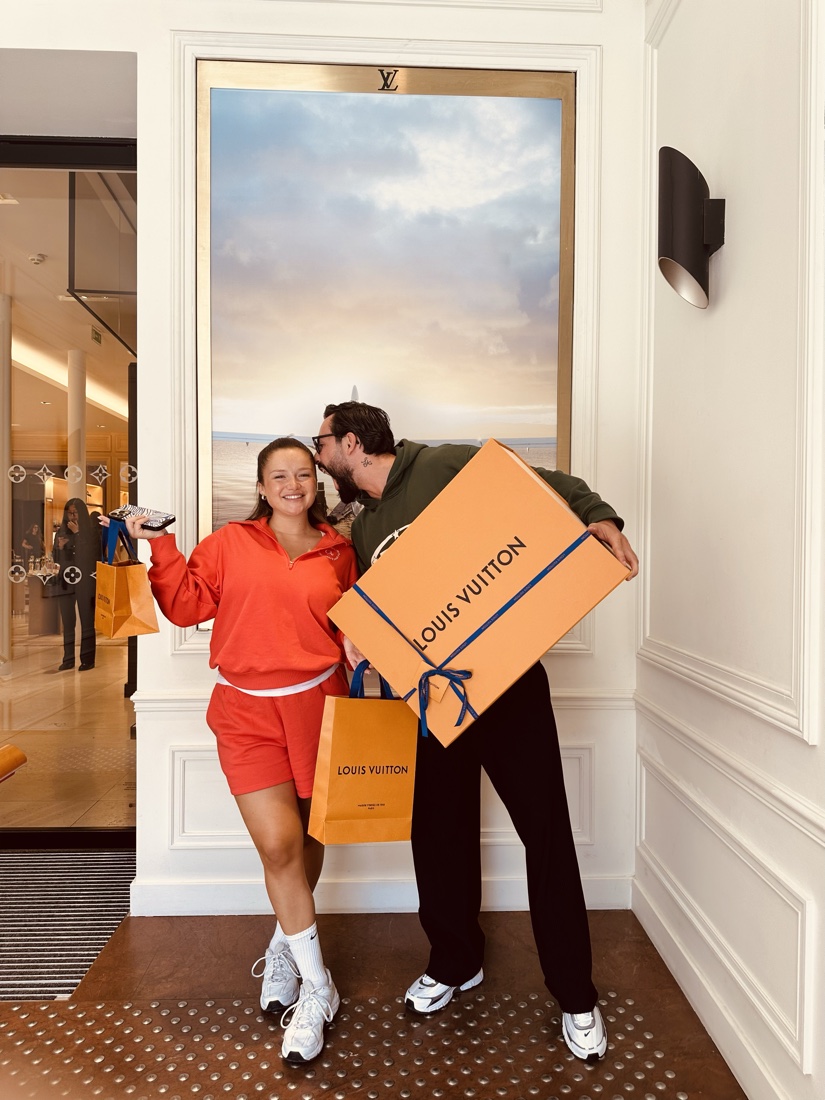 A winner unboxing a prize